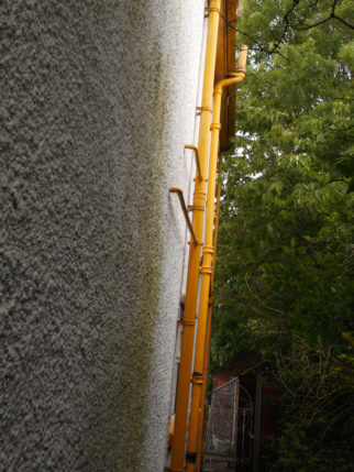 Drain pipe and wall, before work done